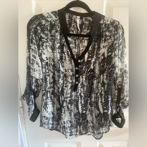 Transparent pull over top perfect for the office priced low for quick sale.
